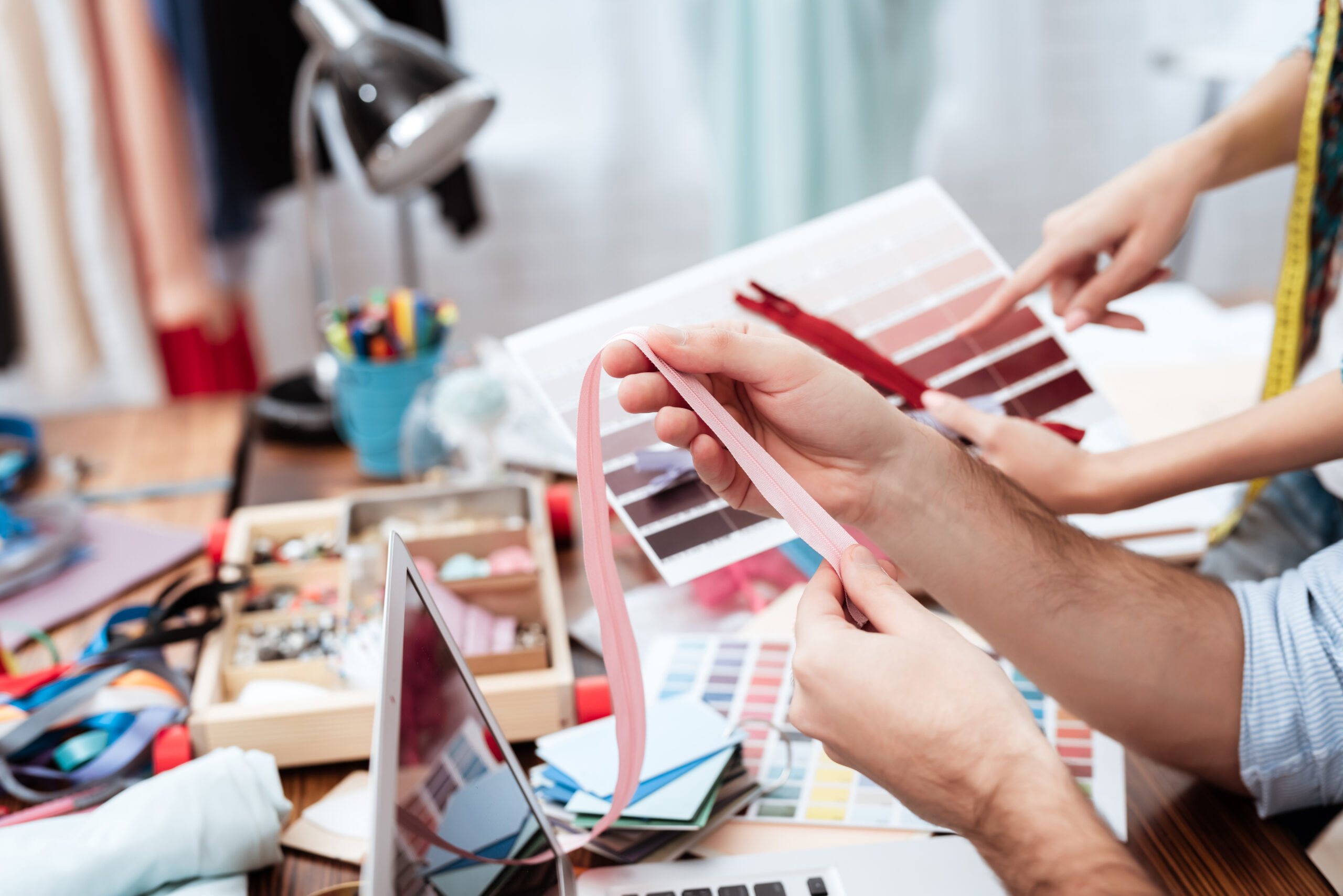 Two fashion designers looking at color palette - Website Design | McWilliams Media |Broken Arrow, OK Product Sourcing in India